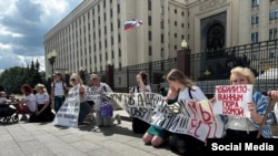 Women demand the return of husbands and sons from Ukraine outside the Defense Ministry in Moscow at a previous demonstration in June.