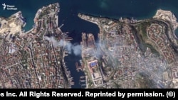 A satellite image shows the aftermath of Ukraine's strike on Russias's Black Sea Fleet headquarters in Sevastopol on September 22.