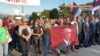 WATCH: Bosnian Serb Protesters Wave Putin Portraits