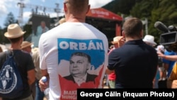 A crowd listens to a speech by Hungarian Prime Minister Viktor Orban in the Romanian town of Tusnad on July 27. 