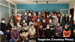 A Taaghche team photo also shows some women ignoring the Islamic dress code.