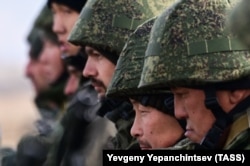 Russian citizens mobilized in September 2022 depart for military training.