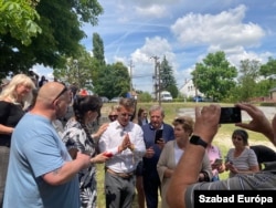 Peter Magyar (center) campaigns in Fejer County.