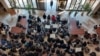 Students hold a sit-in in protest at a university in Iran. 