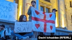 Protesters rally outside the parliament in Tbilisi on May 18.