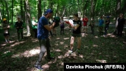 Boxing at the Call Of The Ravine camp in Ukraine. Serhiy Zolotarenko, a boxing coach from nearby Cherkasy, leads the training. 