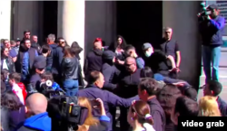 Protesters rally outside Tbilisi State University on May 17.