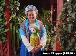 Maria Fedul wears the traditional Russian clothing that she produces and sells to her fellow Lipovans as well as to tourists in Sarichioi.