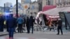 Russian investigators work at the damaged St. Petersburg cafe where Maksim Fomin (aka Vladlen Tatarsky) was killed in a blast in April.