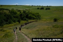 Children take a 30-kilometer hike in Kholodniy Yar, a picturesque region where pro-independence Ukrainian partisans held out over a century ago.