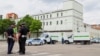 Police officers stand near detention center No.1 in Rostov-on-Don during a hostage crisis on June 16. 