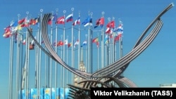 European flags fly behind a sculpture depicting the mythological Abduction of Europa on what is now Eurasia Square in Moscow.