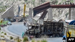 Pakistan's Balochistan Province, seen here in a photo from August after a blast blamed on separatists destroyed a vehicle and collapsed a railway bridge, has been the scene of years of mounting violence.