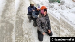 Security forces line up migrants in Yekaterinburg, Russia, in January.