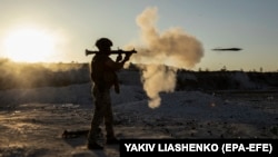 A Ukrainian soldier of the Donbas battalion takes part in military training close to the front line in Donetsk, Ukraine, on October 15. 