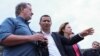 (Left to right) U.S. Senator Gary Peters (Democrat-Michigan), Syunik Governor Robert Ghukasian, and U.S. Ambassador to Armenia Kristina Kvien look out from the Armenian side of the border near the town of Kornidzor on September 23.