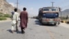 Vehicles wait to pass through the Torkham border crossing earlier this month