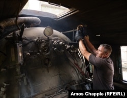 Miralem Oderovic operates the train during his shift at the Sikulje mine.