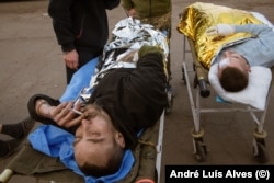 At a triage site near the deadly battle for Avdiyivka, the wounded come in waves – sometimes dozens of soldiers in a single day.