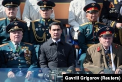 Serdar Berdymukhammedov (center) attends Russia's Victory Day parade in Moscow on May 9, 2023.