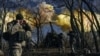 Ukrainian soldiers fire a self-propelled howitzer toward Russian positions near Bakhmut, on March 5.