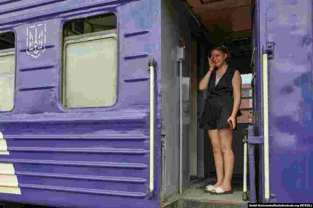 A young woman cries as she bids farewell to family members during an evacuation of Pokrovsk, in the Donetsk Region on August 30, 2024.&nbsp;