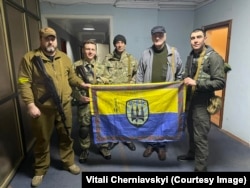 Vitaliy Chernyavskiy (second from left) with comrades at the beginning of the full-scale war.