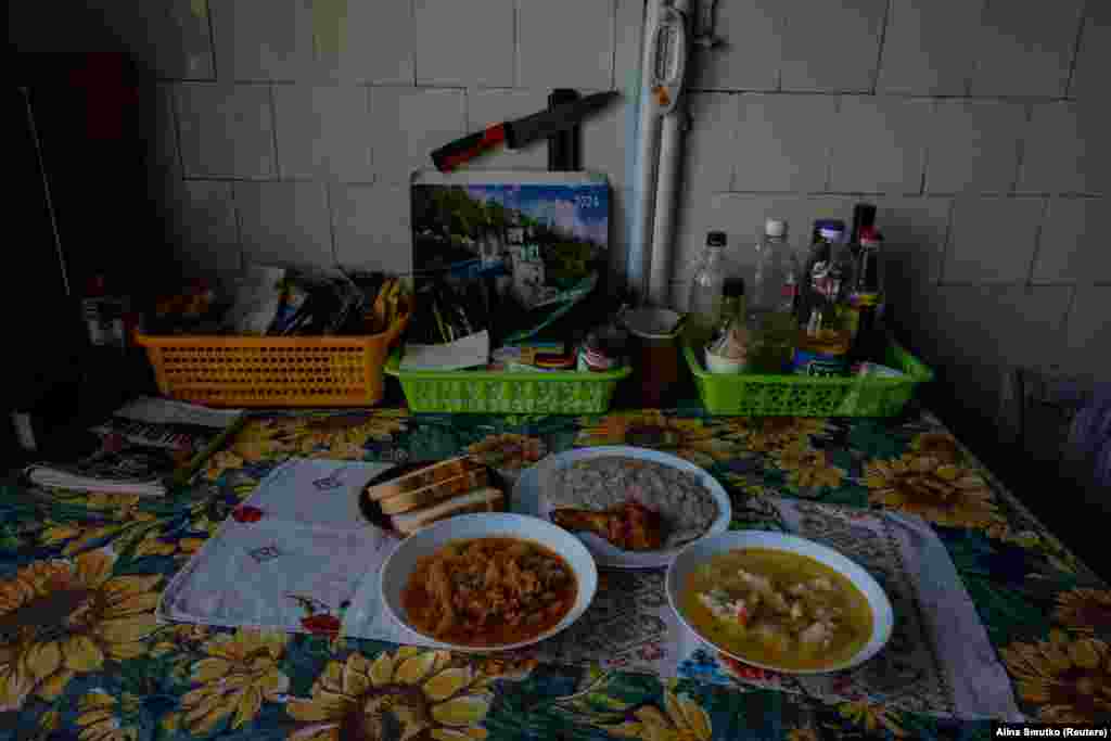 Dishes of food prepared by volunteers. Russian attacks on Ukraine&#39;s electricity infrastructure have forced residents of damaged houses and buildings to flee potentially lethal low temperatures. &nbsp;