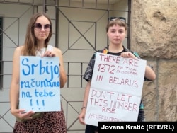 Hnyot's supporters stand outside the Court of Appeals in Belgrade on August 27.