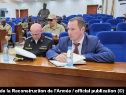 Denis Pavlov (right) at the meeting between CAR defense officials and a high-level Russian delegation on September 1.