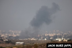 Smoke billows over the northern Gaza Strip during Israeli bombardment on October 22.