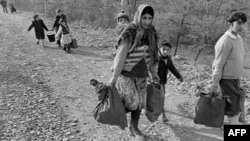 Armenian refugees leave villages in Azerbaijan in December 1988 during the Nagorno-Karabakh War.