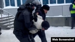 Russian police detain a protester in Ufa on January 19. 