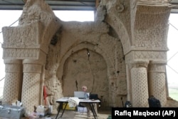 Roland Besenval, director of the French Archaeological Delegation in Afghanistan, works at the site restoring Noh-Gonbad in May 2008.