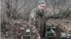  The video appears to show an unidentified, detained Ukrainian soldier standing in a trench being shot dead with automatic weapons after saying, "Glory to Ukraine."