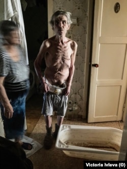 This is a photo of Yuri Nikolayevich that I took on my mobile phone when I entered his apartment. Published with the permission of Nikolaevich and his family.