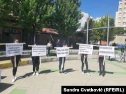 Female activists from the NGO Voice of Roma, Ashkalis, and Egyptians (VoRAE) protest at a multicultural festival in Pristina in June 2021.