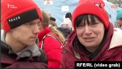 A Kharkiv woman breaks down crying while talking to RFE/RL's Ukrainian Service in Lviv on March 6.