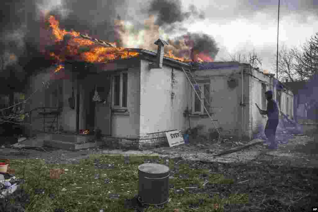 A house on fire following shelling in the town of Irpin, 26 kilometers west of Kyiv, on March 4.