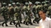 Chinese riot police patrol a street in Urumqi in China's Xinjiang Province. (file photo)