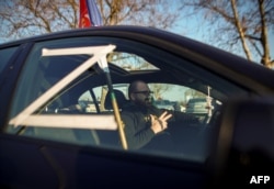 The letter Z, used to identify Russian military equipment in Ukraine, is seen on a car in Belgrade on March 13 during a protest in support of the Russian invasion.