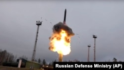 An intercontinental ballistic Avangard missile lifts off from a truck-mounted launcher somewhere in Russia in this undated photo.