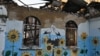 A painting on a wall at a heavily damaged cultural center in Irpin, northwest of Kyiv (file photo)