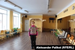 Hanna Khimich standing in her school’s gym, which was recently turned into a “point of invincibility” -- a place where people can gather in case of power outages and other problems.