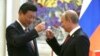 Chinese President Xi Jinping (left) and his Russia counterpart, Vladimir Putin (file photo)