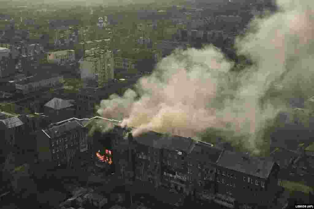 An apartment building in Bakhmut burns after Russian shelling on December 7.&nbsp; Russian forces continued their relentless rocket attacks and bombardments on Ukrainian positions in Donetsk, with particular focus on Bakhmut -- a city that has been under attack for nearly seven months.