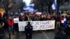 Russians and others march against Moscow's invasion of Ukraine in Belgrade in December 2022.