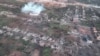 Smoke rises from a missile strike on the town of Soledar on January 13. Multiple reports suggest that Russian forces have nearly taken the town, which is being described as "scorched earth." 