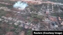 Smoke rises from a missile strike on the town of Soledar on January 13. Multiple reports suggest that Russian forces have nearly taken the town, which is being described as "scorched earth." 