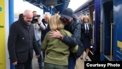 European Council President Charles Michel is greeted upon his arrival in Kyiv on April 20. 